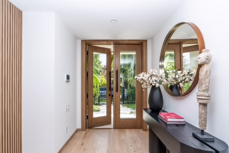 Traditional hinged entry door with sidelites