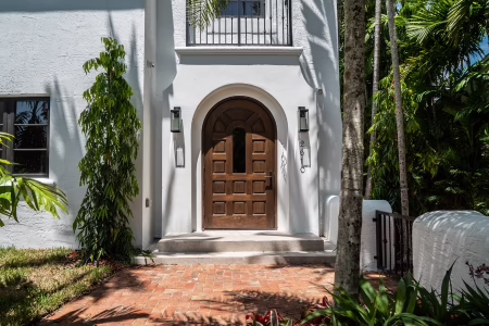 Custom wood door with modern design on Florida home